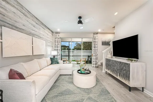 a bathroom with a sink mirror and toilet