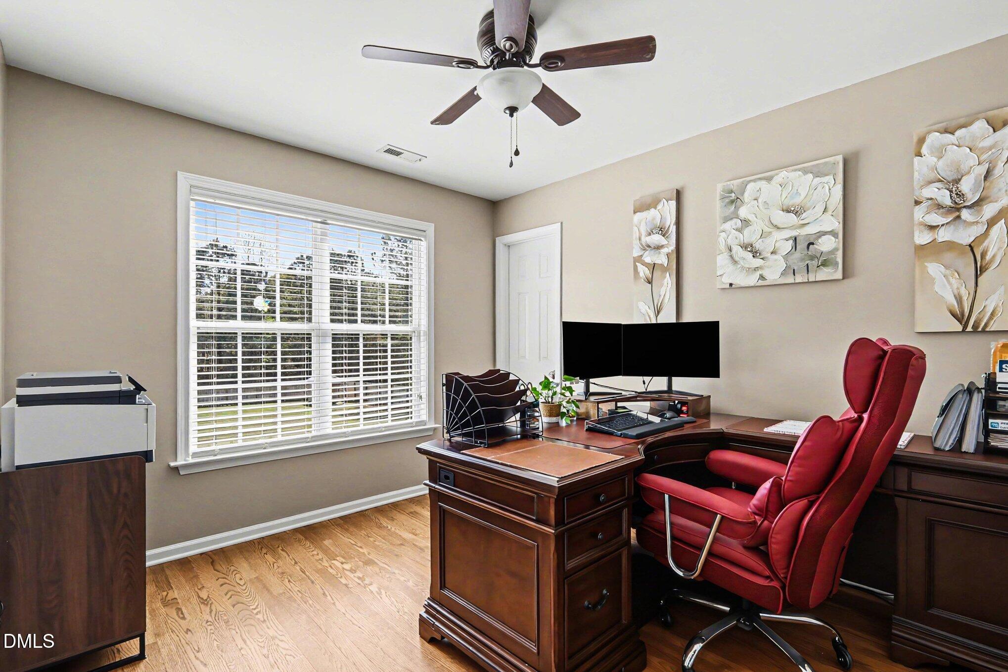 313 Blaze Ridge Drive Smithfield, NC 27577 - Photo 11 of 30 a work room with furniture and windows
