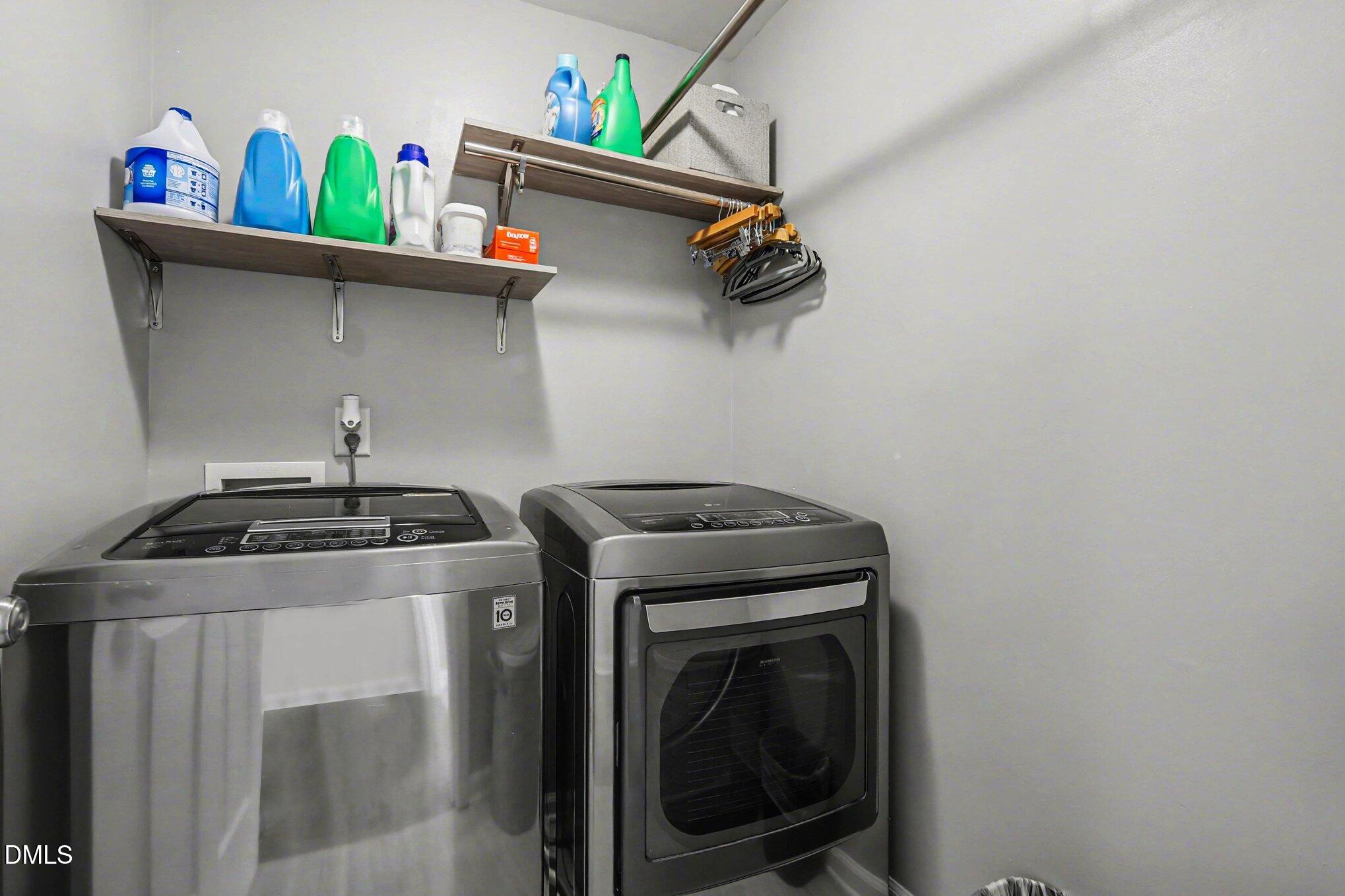 313 Blaze Ridge Drive Smithfield, NC 27577 - Photo 12 of 30 a utility room with dryer and washer