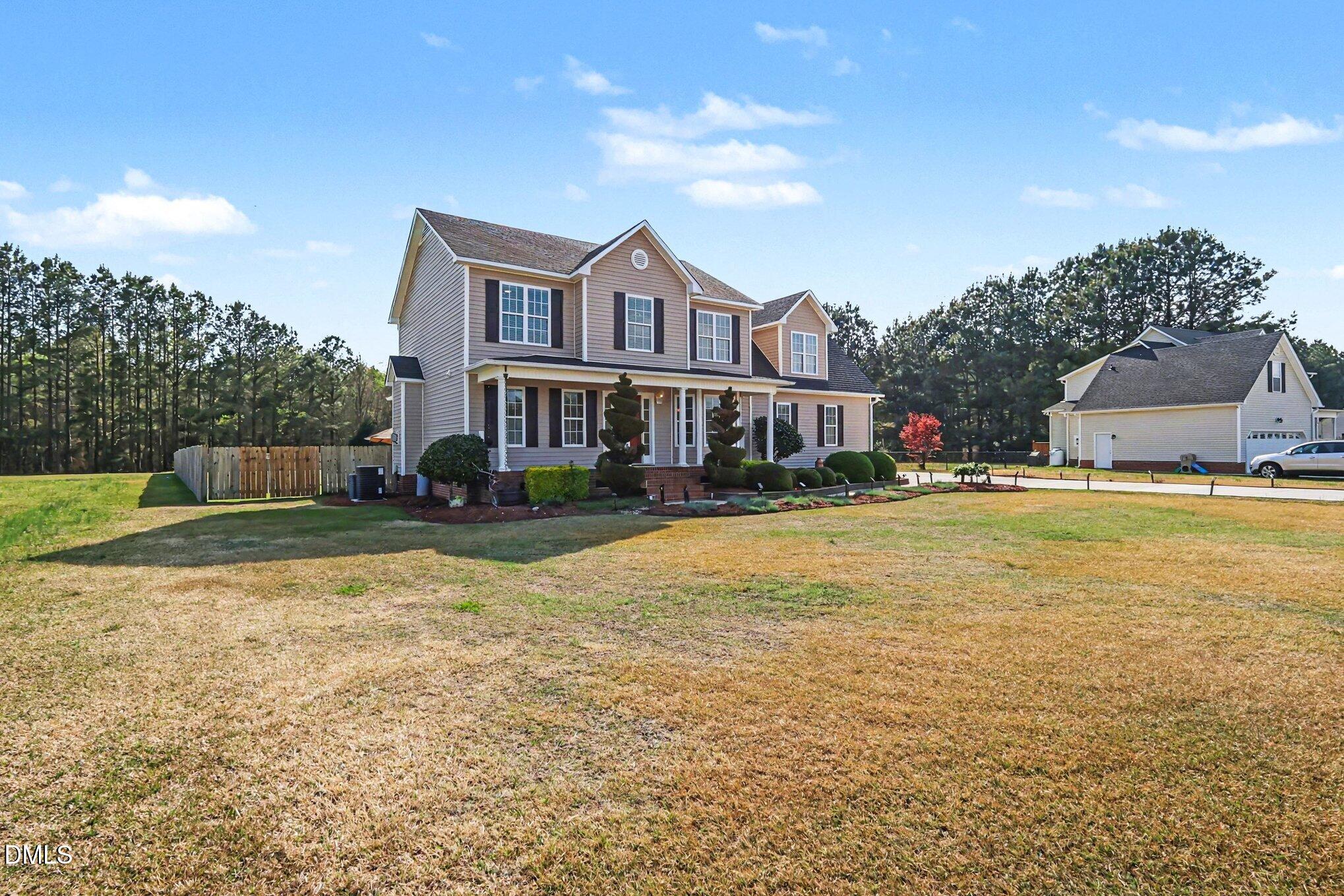 313 Blaze Ridge Drive Smithfield, NC 27577 - Photo 22 of 30 a swimming pool view with a outdoor space