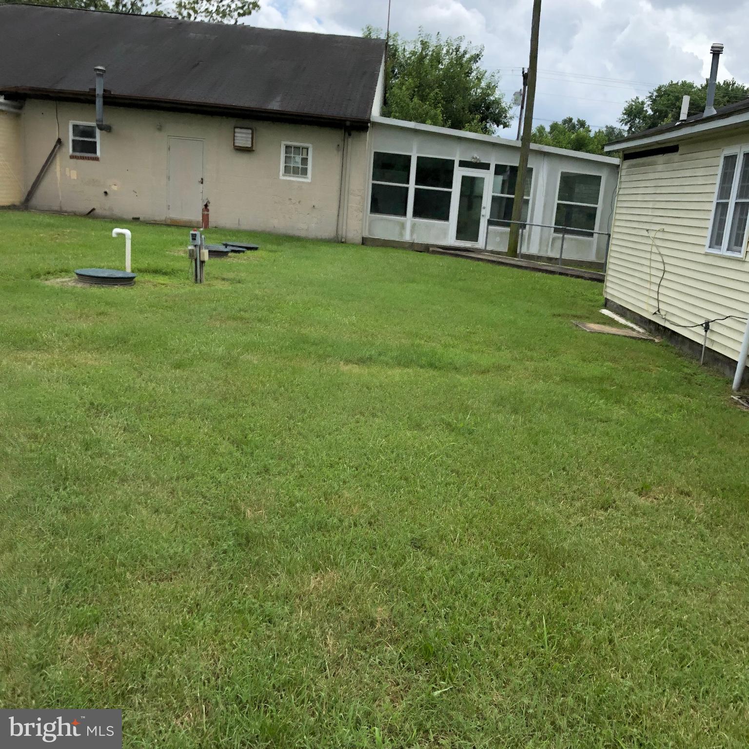 25548 Hill Road Greensboro, MD 21639 - Photo 10 of 11 a view of a house with a backyard