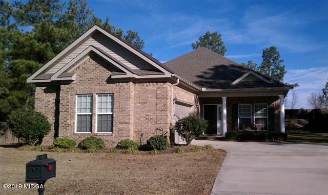 114 Timber Ridge Boulevard Byron, GA 31008 - Photo 1 of 1 a front view of a house with a yard
