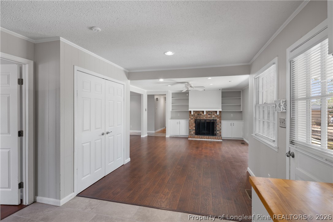 400 Hallmark Road Fayetteville, NC 28303 - Photo 19 of 37 a view of a kitchen with a sink and a fireplace