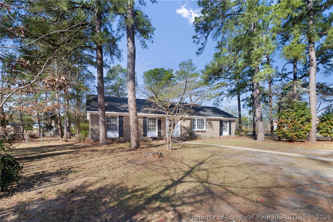 400 Hallmark Road Fayetteville, NC 28303 - Photo 2 of 37 front view of a house with a tree