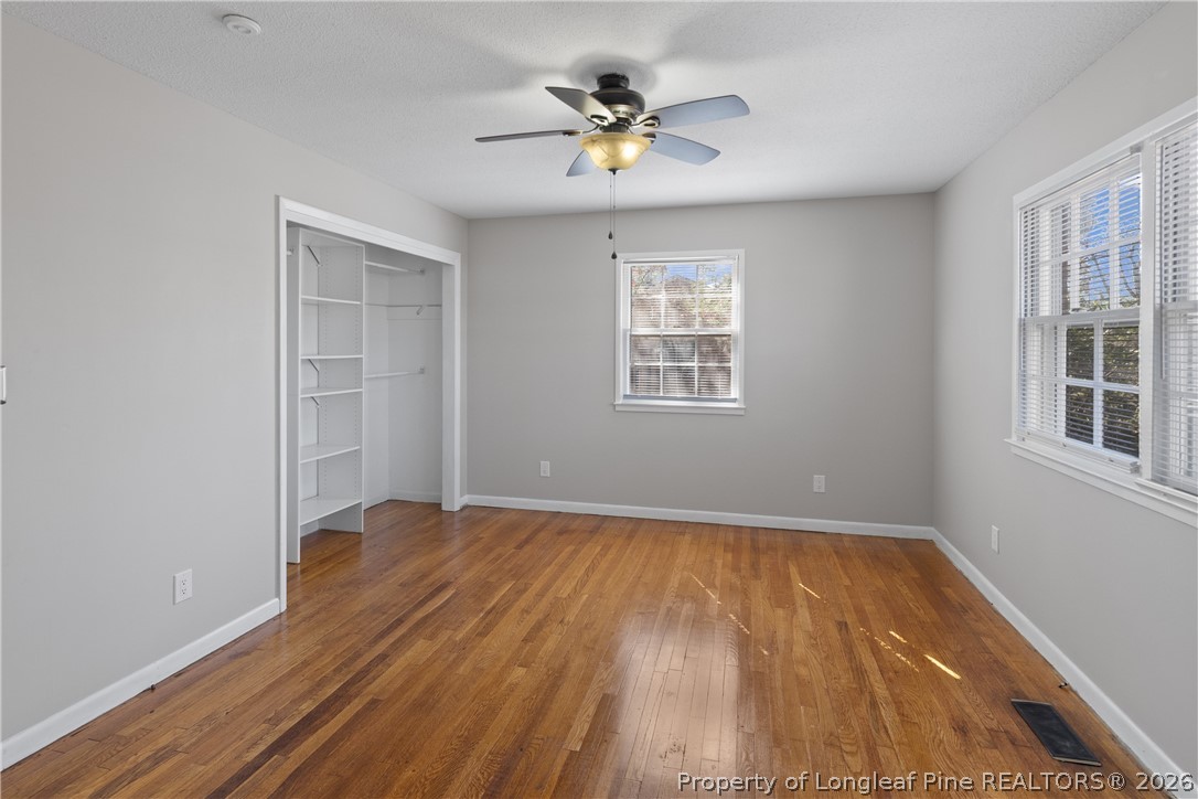 400 Hallmark Road Fayetteville, NC 28303 - Photo 21 of 37 wooden floor in an empty room with a window