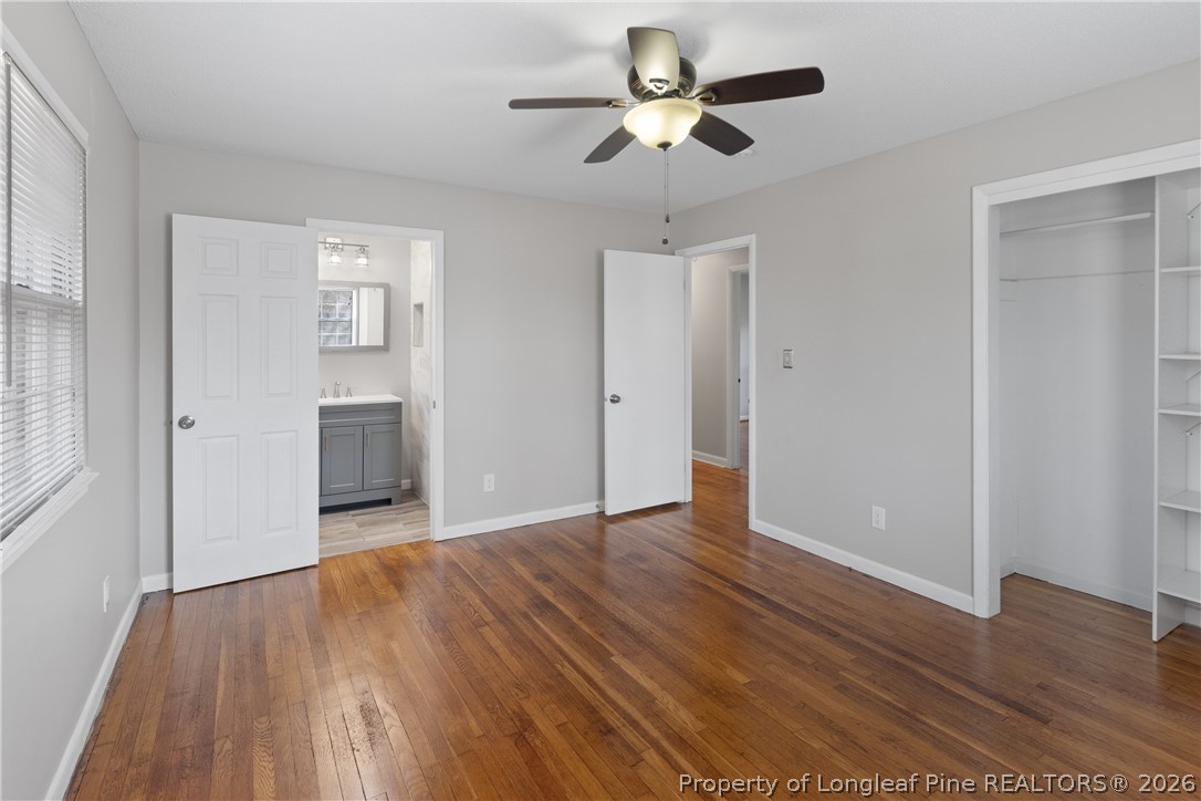 400 Hallmark Road Fayetteville, NC 28303 - Photo 22 of 37 wooden floor in an empty room with a window