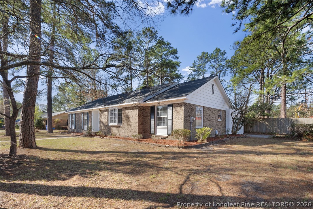 400 Hallmark Road Fayetteville, NC 28303 - Photo 3 of 37 a front view of a house with a yard
