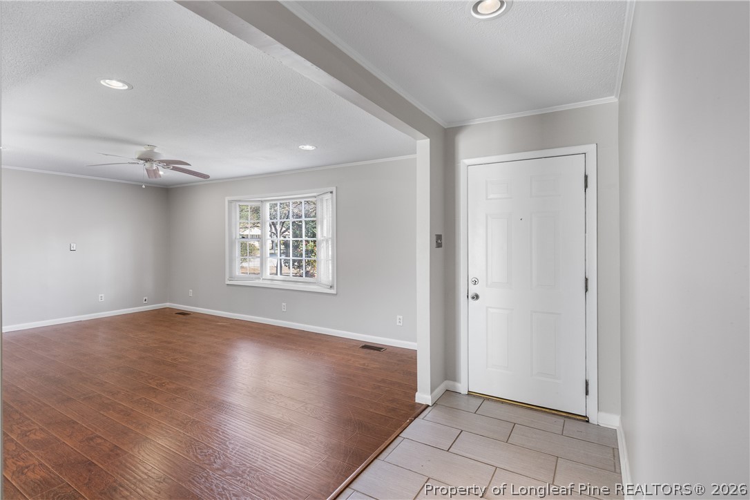 400 Hallmark Road Fayetteville, NC 28303 - Photo 4 of 37 wooden floor in an empty room with a window