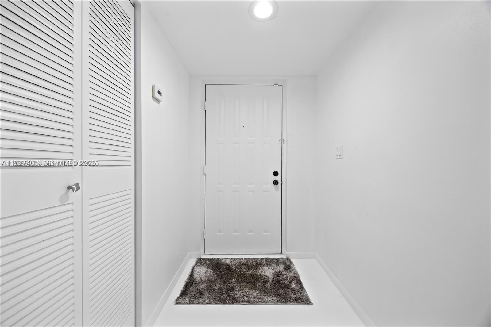 8810 Southwest 132nd Place, Unit 101DN Miami, FL 33186 - Photo 3 of 6 a bathroom with a sink