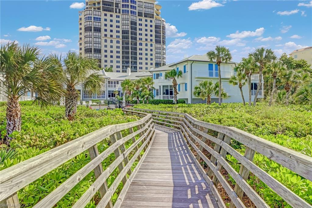 74 Seagate Drive, Unit 4 Naples, FL 34103 - Photo 34 of 35 a view of a large building