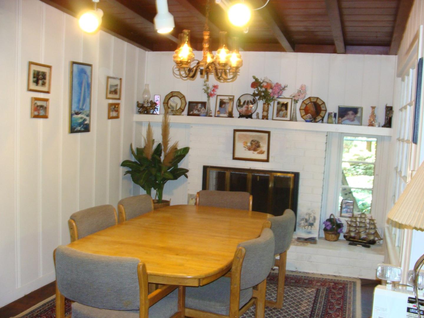7150 Croy Road Morgan Hill, CA 95037 - Photo 18 of 67 a view of a dining room with furniture and chandelier