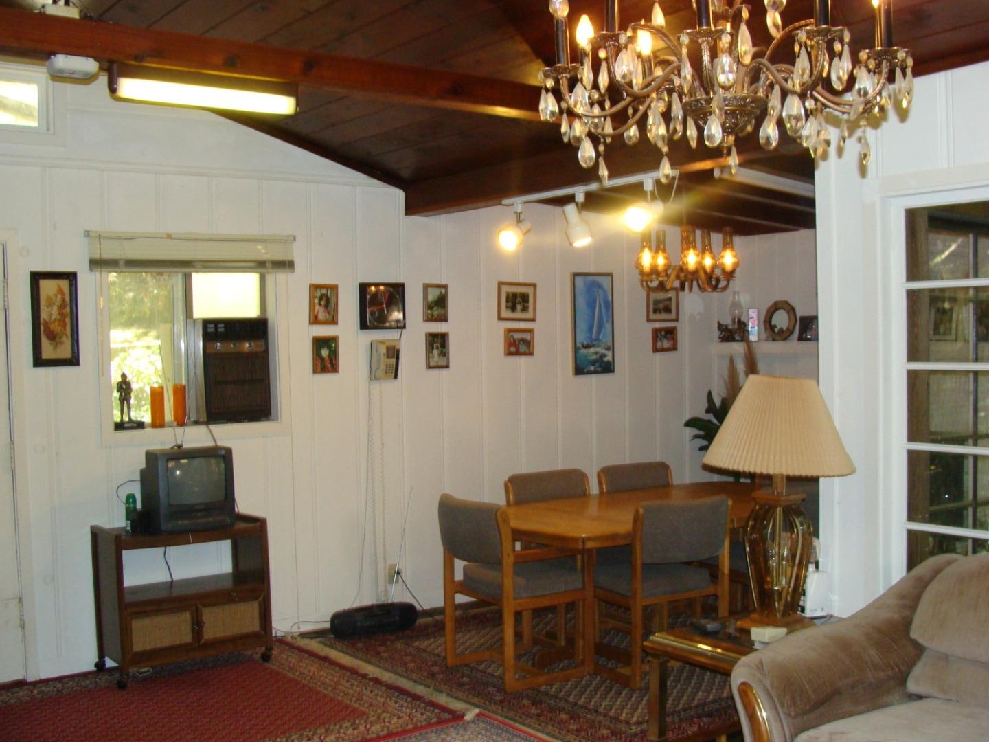 7150 Croy Road Morgan Hill, CA 95037 - Photo 27 of 67 a dining room with furniture and chandelier