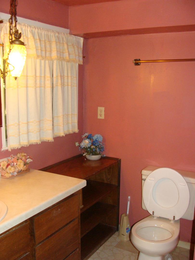 7150 Croy Road Morgan Hill, CA 95037 - Photo 31 of 67 a bathroom with a sink toilet and shower