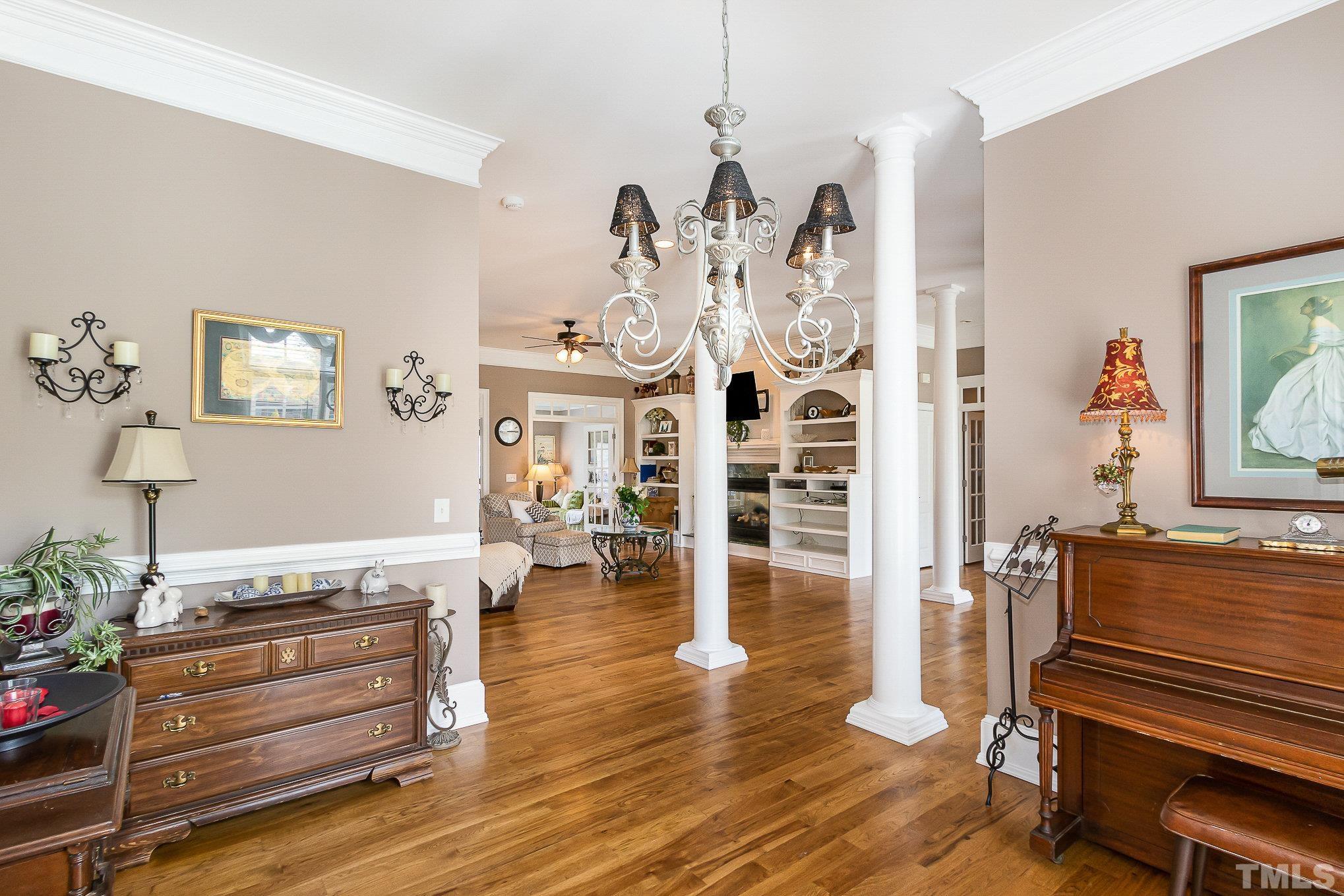 3733 Johnson Pond Road Raleigh, NC 27603 - Photo 11 of 41 a living room with furniture and wooden floor