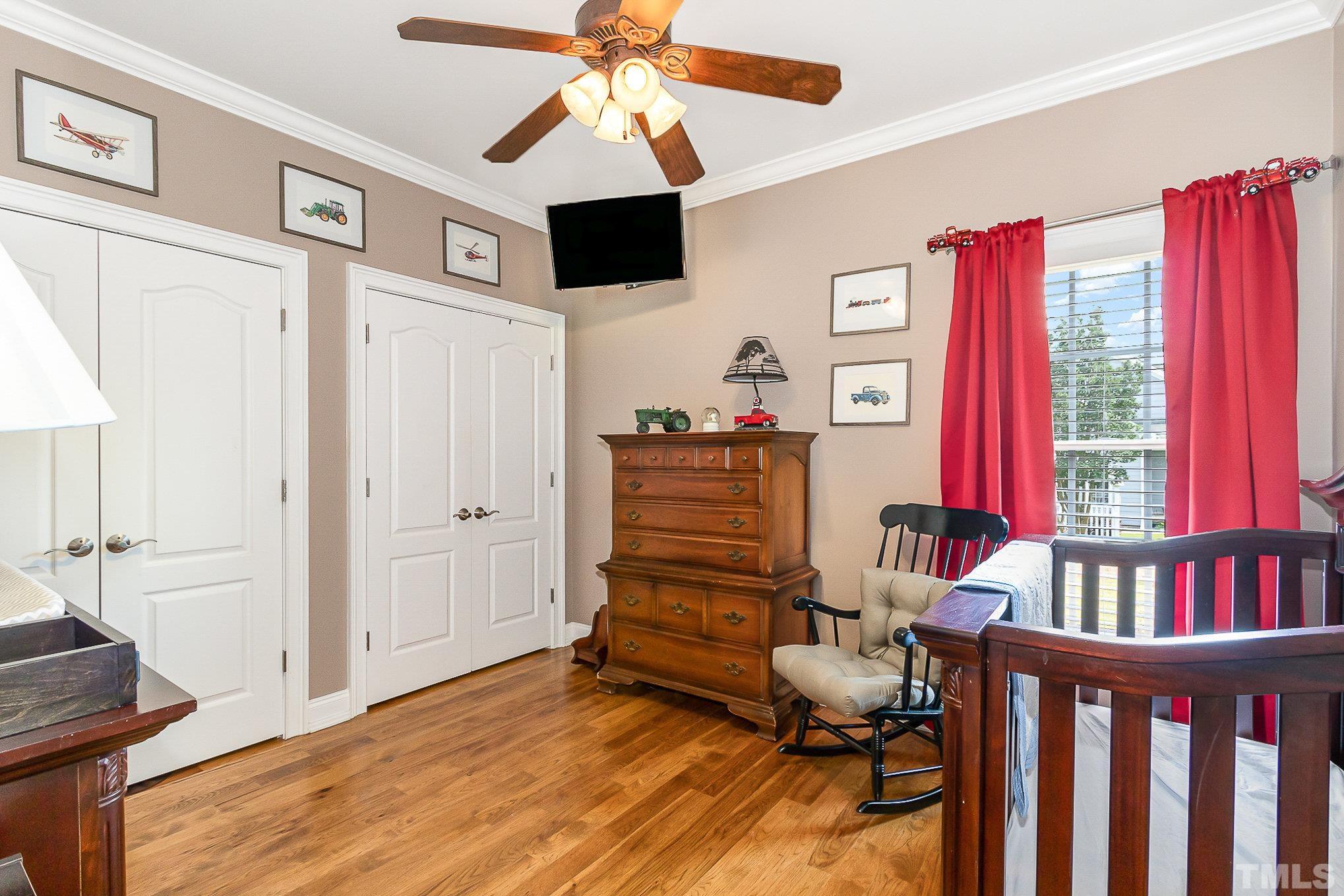 3733 Johnson Pond Road Raleigh, NC 27603 - Photo 25 of 41 a bedroom with furniture and a window