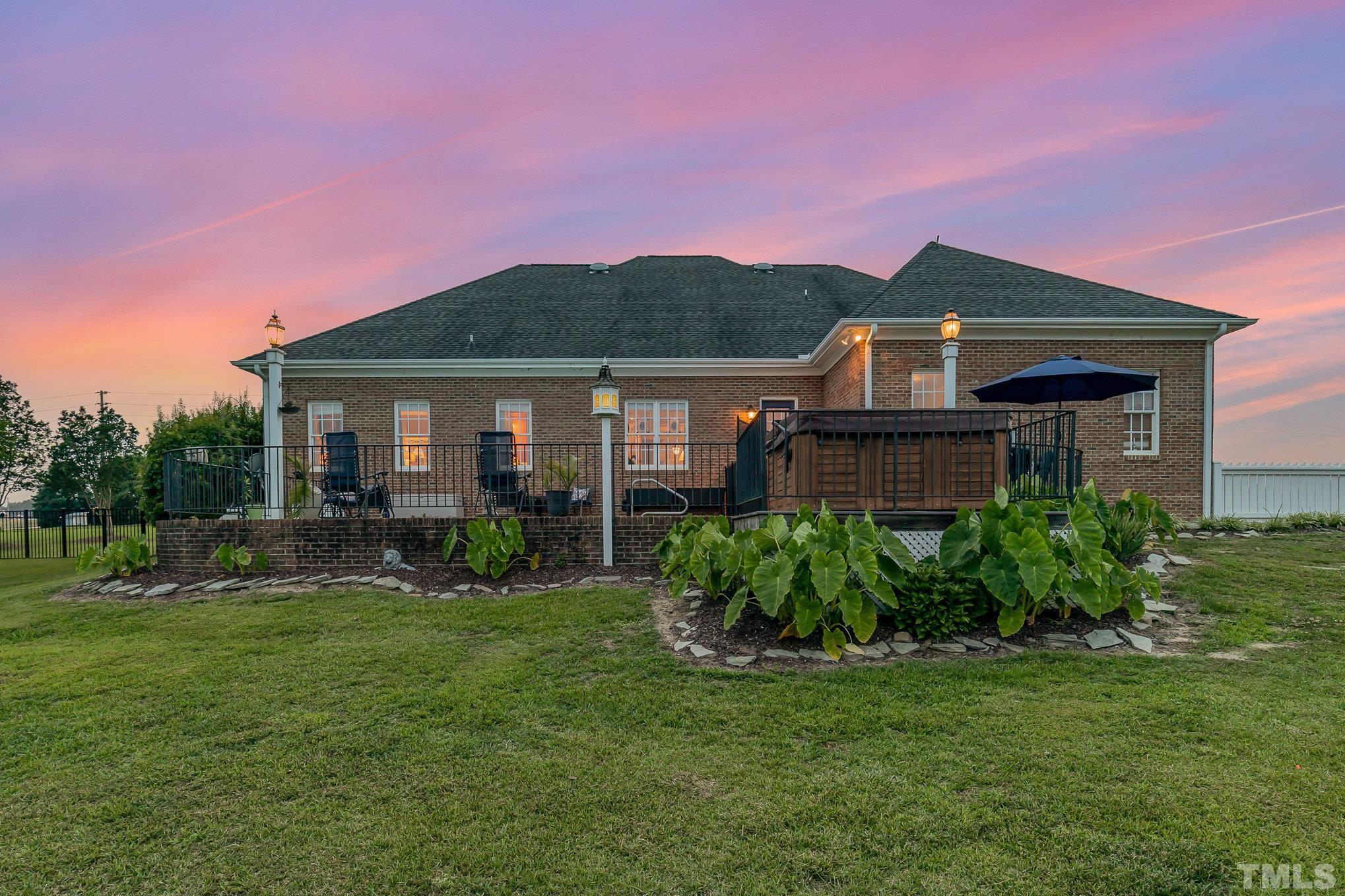 3733 Johnson Pond Road Raleigh, NC 27603 - Photo 30 of 41 a front view of a house with a yard