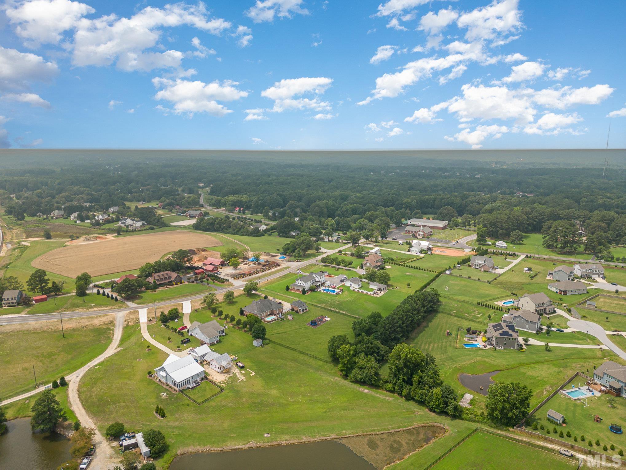3733 Johnson Pond Road Raleigh, NC 27603 - Photo 33 of 41 a view of a lake