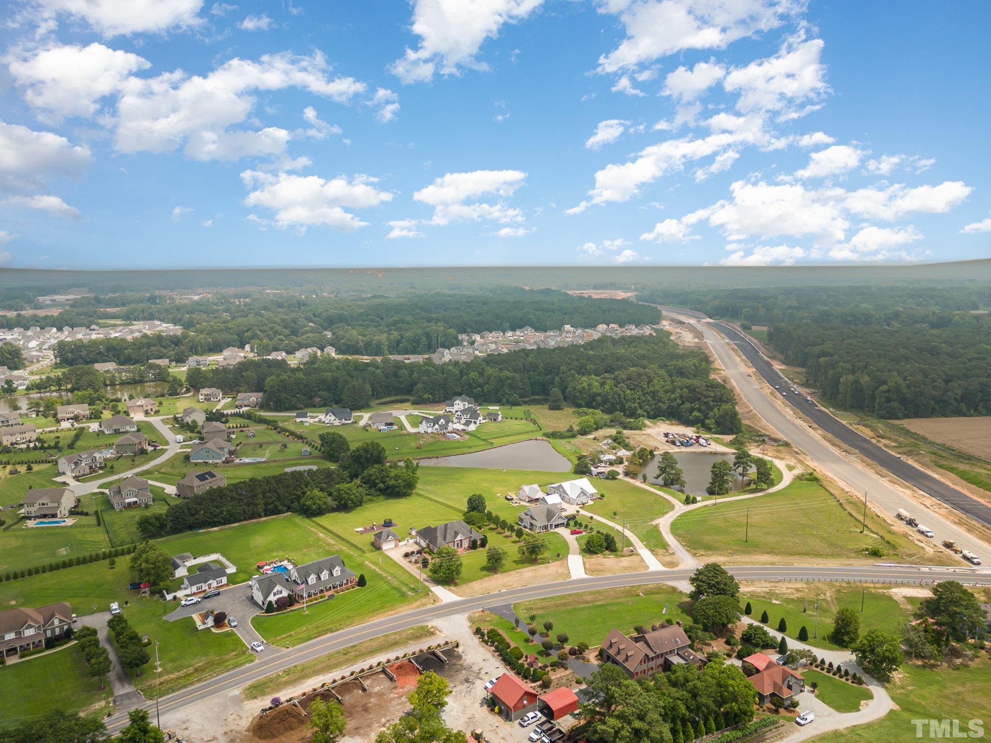 3733 Johnson Pond Road Raleigh, NC 27603 - Photo 34 of 41 a view of a city with an ocean