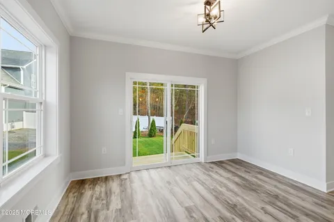 a view of a ocean with lawn chairs