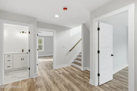 an aerial view of a house with a swimming pool