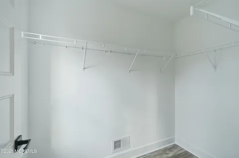 an aerial view of a house with a garden