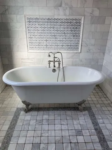 a view of a city with a tall building in the background