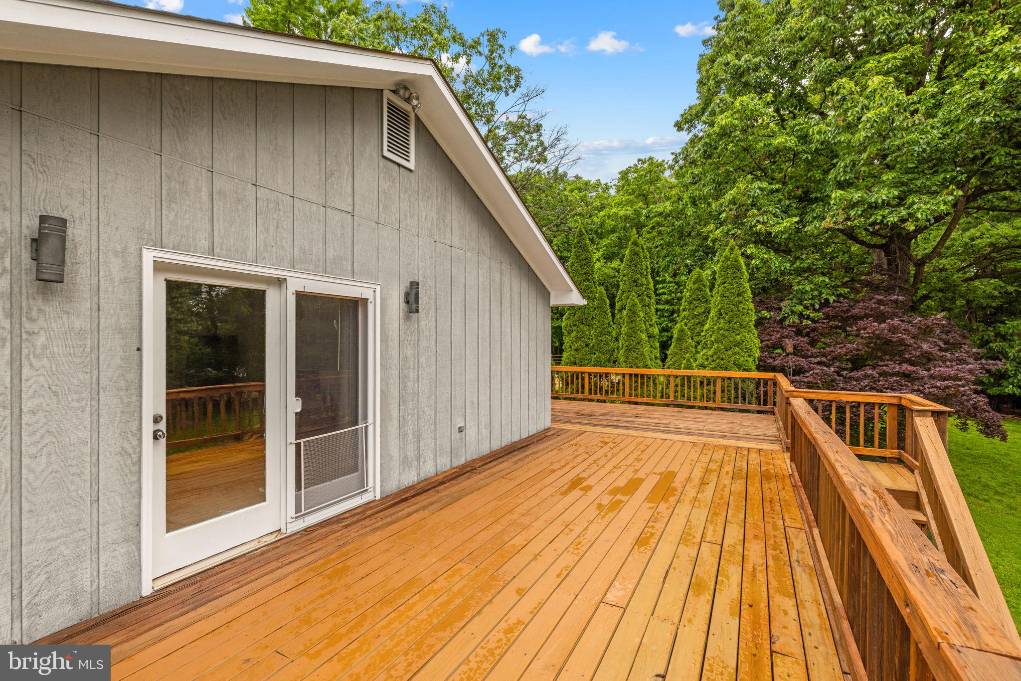 41726 Stumptown Road Leesburg, VA 20176 - Photo 47 of 91 Wraparound Decking from Primary Bedroom to Back