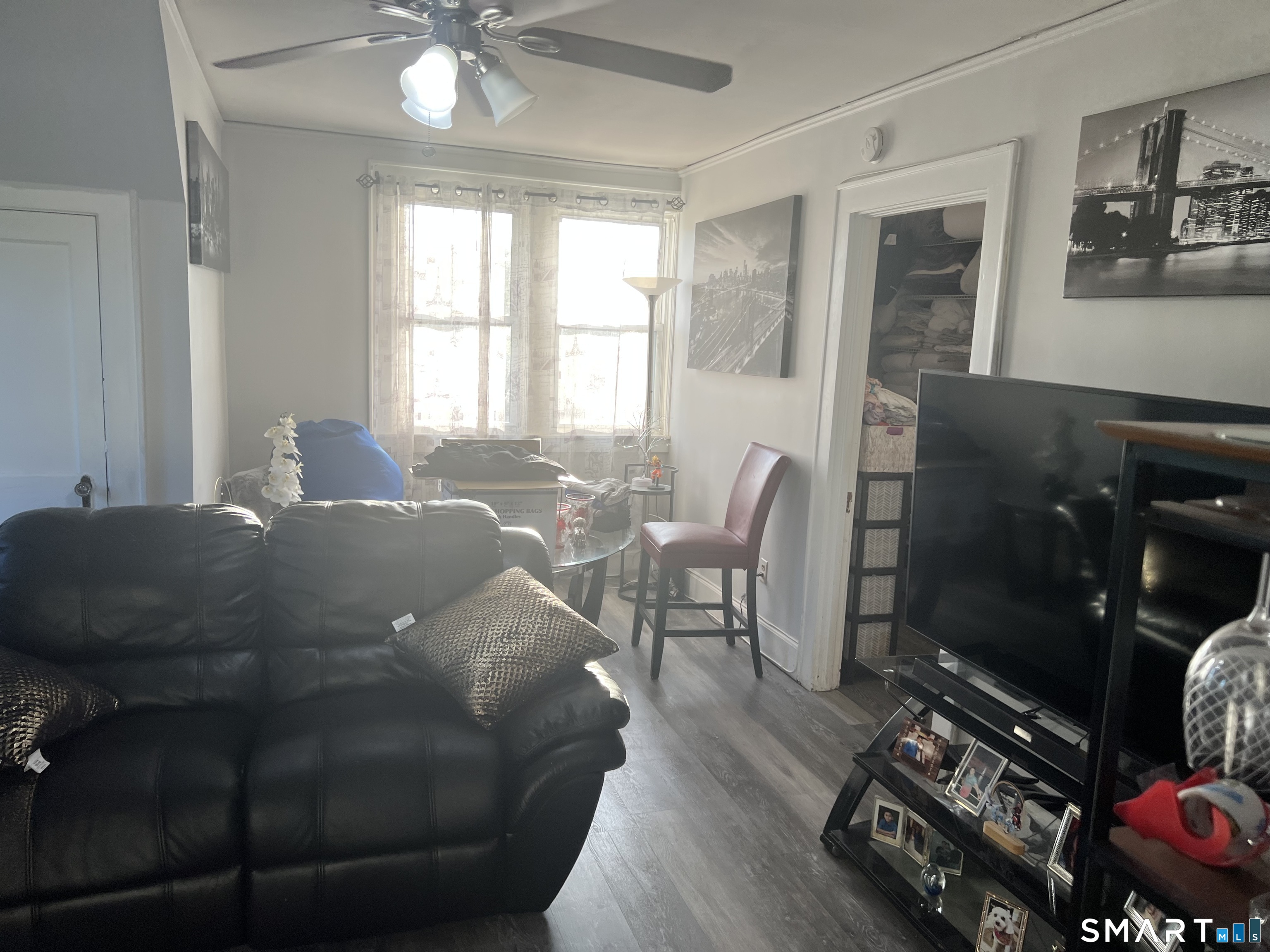 275 Long Ridge Road Stamford, CT 06905 - Photo 15 of 40 a living room with furniture and floor to ceiling window