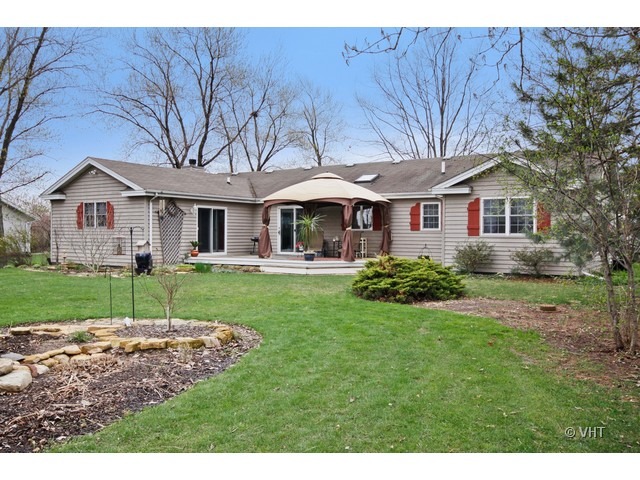 20112 West Manhattan Road Elwood, IL 60421 - Photo 15 of 15 a front view of a house with a yard