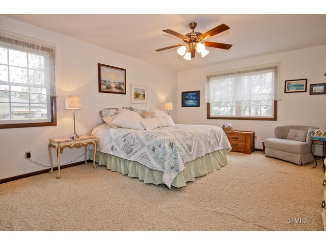 20112 West Manhattan Road Elwood, IL 60421 - Photo 8 of 15 a bedroom with bed and window