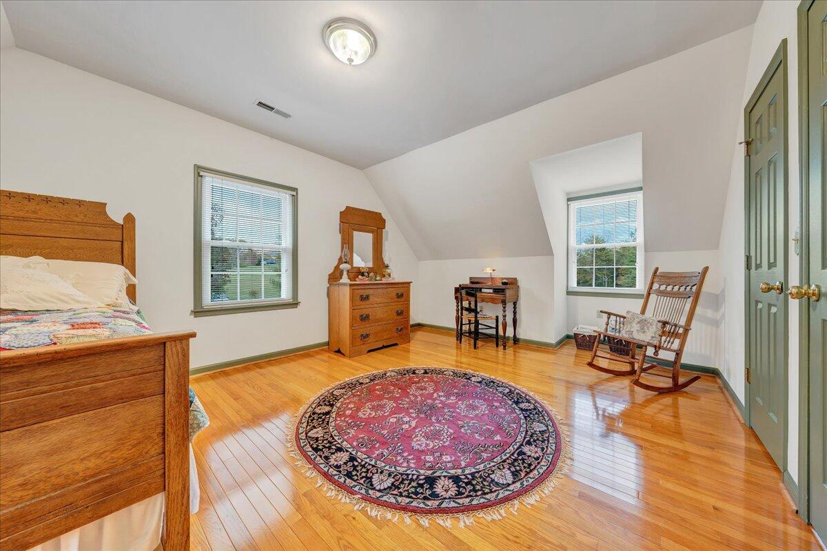 204 Raintree Lane Boones Mill, VA 24065 - Photo 23 of 58 a living room with furniture and a wooden floor