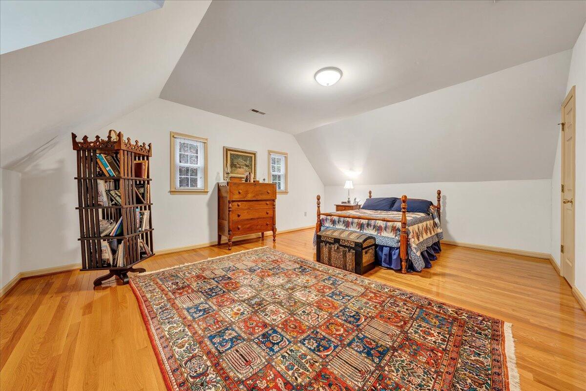 204 Raintree Lane Boones Mill, VA 24065 - Photo 24 of 58 a bed room with a bed and a couch
