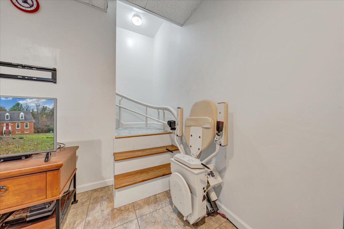 204 Raintree Lane Boones Mill, VA 24065 - Photo 27 of 58 a view of room with stairs and mirrors