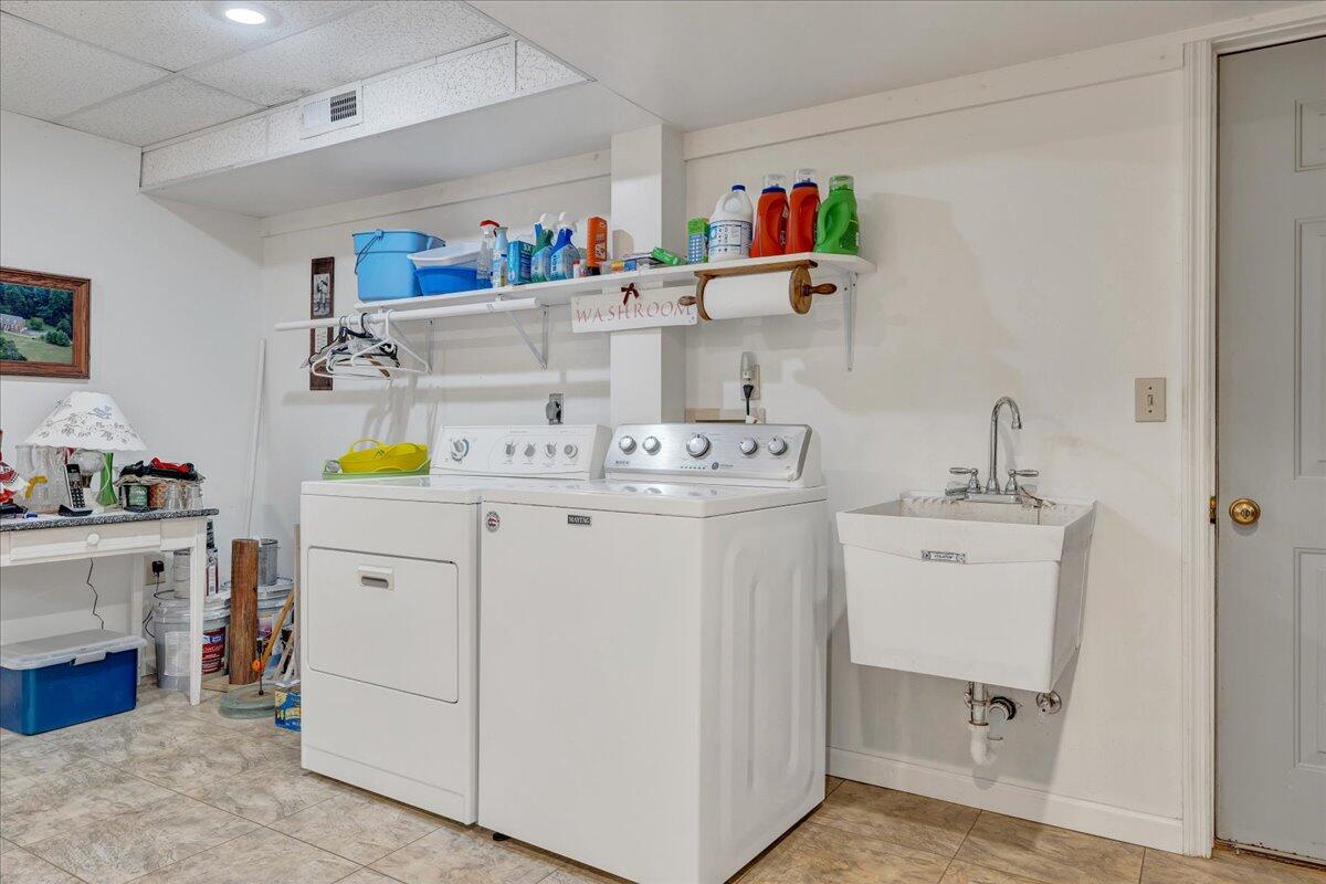 204 Raintree Lane Boones Mill, VA 24065 - Photo 29 of 58 a utility room with dryer and washer