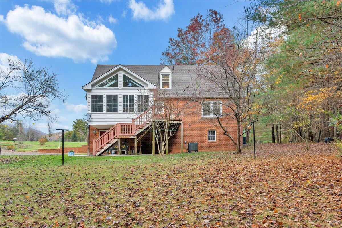 204 Raintree Lane Boones Mill, VA 24065 - Photo 32 of 58 a front view of a house with a yard