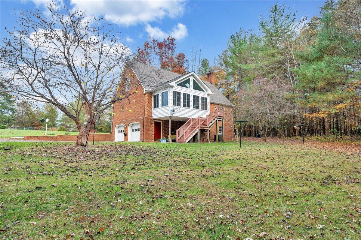204 Raintree Lane Boones Mill, VA 24065 - Photo 33 of 58 a front view of a house with a yard
