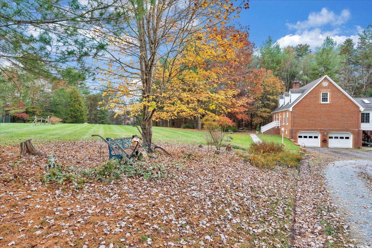 204 Raintree Lane Boones Mill, VA 24065 - Photo 47 of 58 a front view of a house with a yard