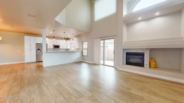 a view of a kitchen with a sink and a stove top oven