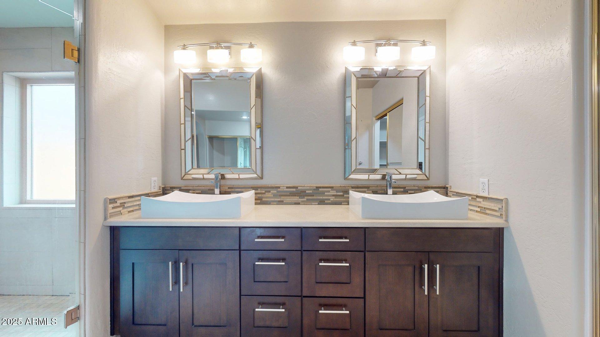 6510 South Hazelton Lane, Unit 142 Tempe, AZ 85283 - Photo 29 of 49 a bathroom with a sink vanity and a mirror