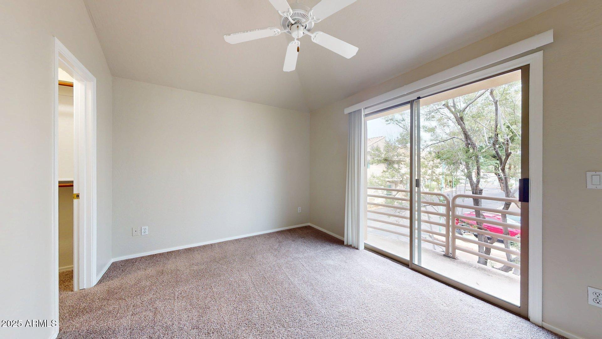 6510 South Hazelton Lane, Unit 142 Tempe, AZ 85283 - Photo 33 of 49 an empty room with windows and fan
