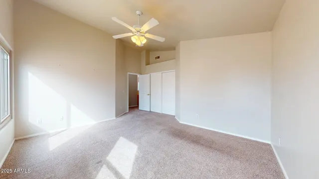 a view of a bedroom with a hallway