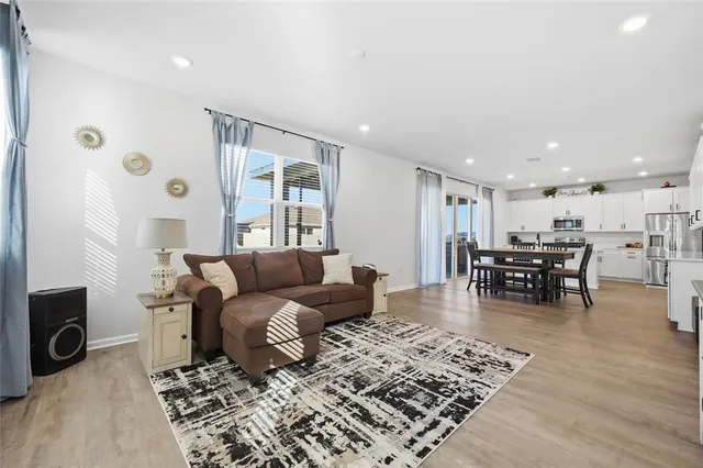 a living room with furniture and a table