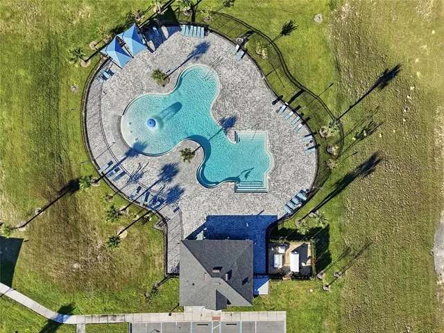 an aerial view of a swimming pool