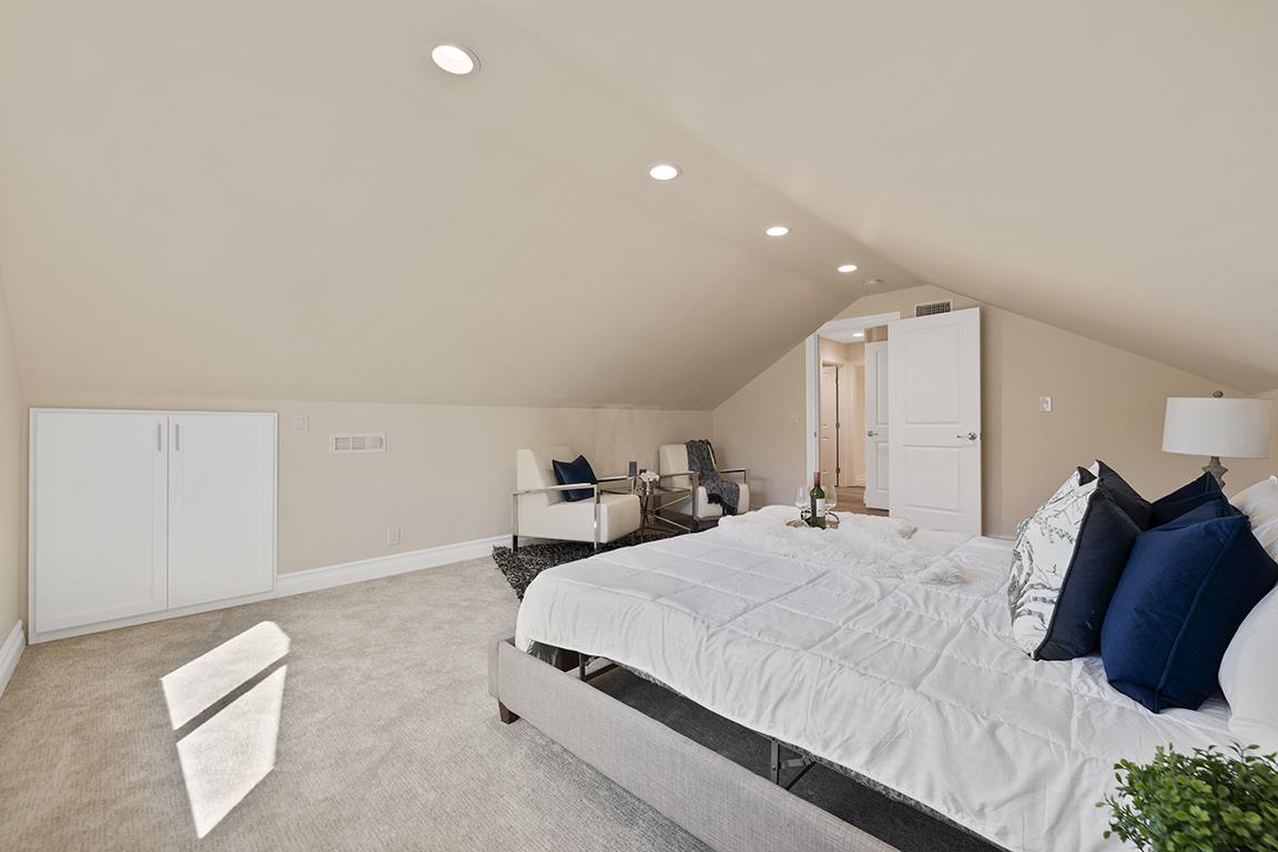 Cero Drive Santa Clarita, CA 91350 - Photo 17 of 45 a bedroom with a bed and a night stand