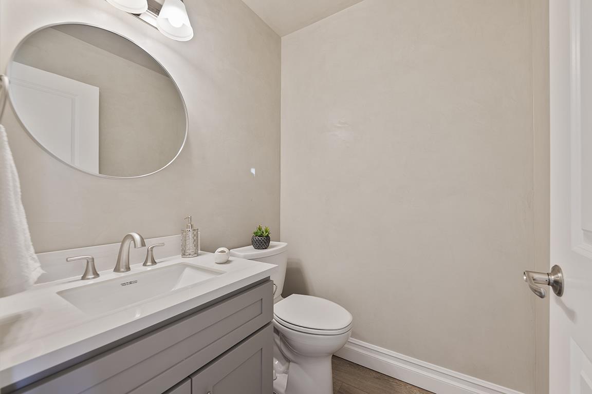 Cero Drive Santa Clarita, CA 91350 - Photo 26 of 45 a bathroom with a toilet sink and mirror