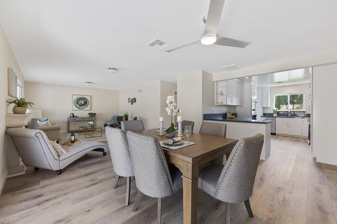 Cero Drive Santa Clarita, CA 91350 - Photo 28 of 45 a view of a dining room with furniture and wooden floor