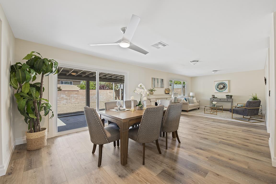 Cero Drive Santa Clarita, CA 91350 - Photo 31 of 45 a view of a dining room with furniture and wooden floor