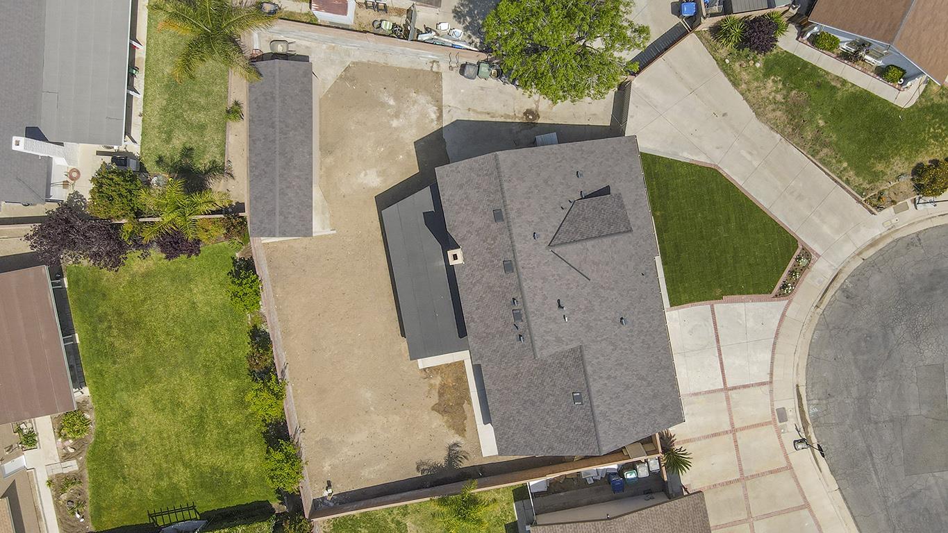 Cero Drive Santa Clarita, CA 91350 - Photo 5 of 45 an aerial view of a house with a backyard
