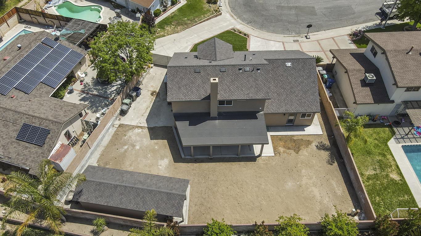 Cero Drive Santa Clarita, CA 91350 - Photo 7 of 45 an aerial view of a house with a yard