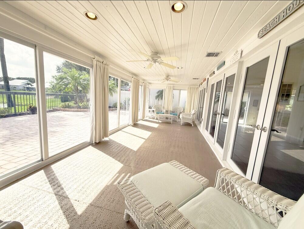 114 Beach Summit Court Jupiter, FL 33477 - Photo 12 of 32 a view of a living room